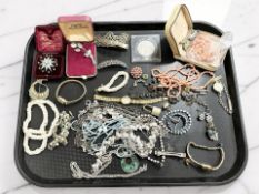 Assorted jewellery including a decorative paste-set star burst brooch, assorted watches,