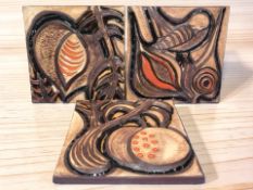 Three Danish Soholm art pottery wall plaques, each 34 cm square.