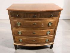 An early 20th century continental mahogany bow front four drawer chest, 90 cm x 52 cm x 94 cm.