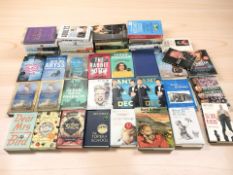 A collection of modern volumes including Anton Dubeke, Sarah Millican, Billy Crystal,