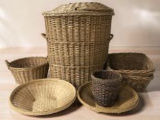 A group of wicker hampers and baskets, tallest 67 cm.