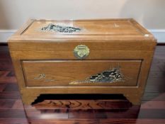 A 20th century Chinese carved camphor wood blanket box, width 102 cm.