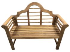 A teak Lutyens style two seater garden bench, length 130 cm.