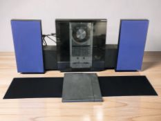 A Bang & Olufsen Beosound Ouverture CD player, and a pair of Bang & Olufsen Type 6201R speakers,