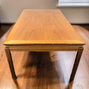 A 20th century Scandinavian high gloss teak rectangular coffee table, 130 cm x 76 cm x 54 cm.