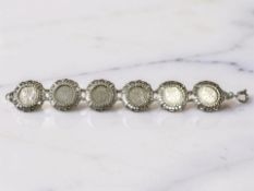 A silver three pence coin bracelet, length 19cm CONDITION REPORT: 26.