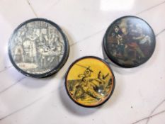Two 19th century papier maché circular snuff boxes, plus a further 20th century example,