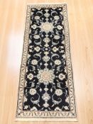 A Nain runner, Central Iran, 194 cm x 76 cm.