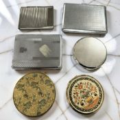 A small group of compacts including Stratton, plated cigarette cases,