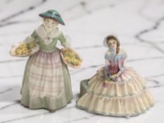 Two Royal Doulton figures 'Daffy Down Dilly' HN1712, and 'Daydreams' HN1731.