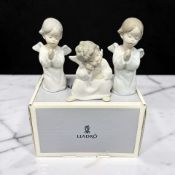 Three Lladro figures of angels, one with box.