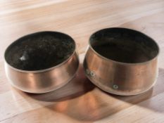 A pair of copper plated planters, diameter 40 cm.