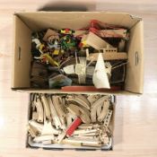 A collection of wooden and plastic toys and models, railway track, large model ship, etc.
