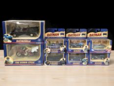 A group of Corgi Batman die cast models, in boxes.