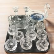 A collection of Scandinavian textured glass tea light holders, pair of candlesticks,