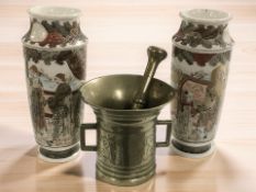 A 19th century bronze bell, mortar and pestle, mortar 15 cm high,