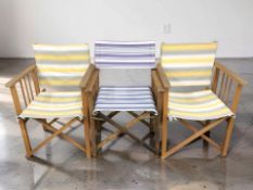 Three director's style folding chairs.