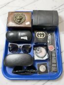 A group of modern jewellery boxes, pair of Ray Ban sunglasses, Chanel sunglasses,