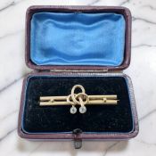 A 9ct gold aquamarine bar brooch,