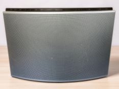 A Bang & Olufsen Beosound 1, with leads.