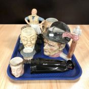 A group of character jugs, figural decanter, etc.