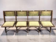 A set of four early 20th century oak folding cinema seats upholstered in buttoned green draylon,