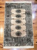 A Lahore Bokhara rug, Pakistan, 123 cm x 75 cm.