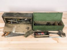 Two antique tool boxes containing assorted hand tools.