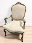A continental painted and gilt salon armchair, width 72 cm.