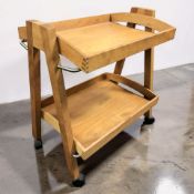 A contemporary Scandinavian two tier trolley, width 57 cm.