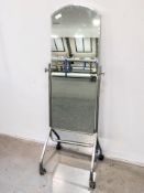 A metal framed bevelled glass cheval mirror,