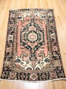 A Hamadan rug, North West Iran, 180 cm x 118 cm.