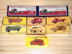 A group of Dinky die cast models with reproduction boxes including 420 Forward Control Lorry,