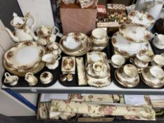 Approximately fifty five pieces of Royal Albert Old Country Roses tea and dinner porcelain,