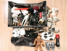 A collection of Star Wars models and figurines, football, etc.
