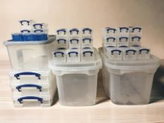 A quantity of plastic storage boxes with snap-on lids, largest 50 cm long.