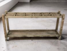 An Edwardian oak stick stand, length 156 cm.