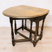 A 20th century oak gate leg table,