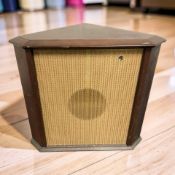 A vintage corner speaker in mahogany veneered case, height 70 cm.