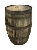 A coopered oak barrell, height 88 cm.