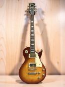 A Les Paul style electric guitar by Vintage.