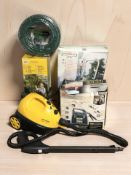 A garden hose, a reel cart, power sprayer, steam cleaner, etc.