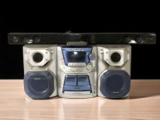 A Panasonic hi-fi system and an LG soundbar.