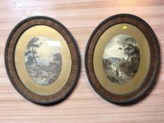 A pair of antiquarian oval framed colour lithographs depicting figures in rural landscapes,