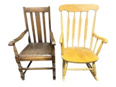 A pine spindle back rocking chair and an Edwardian oak armchair.
