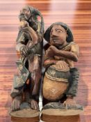 Two carved wooden statues, tallest 45 cm.