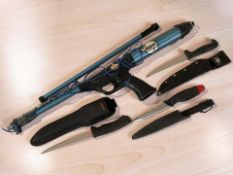 A Nemrod Clipper 1 diving spear gun, and three diving knives.
