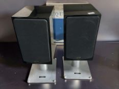 A pair of Quad 12L speakers, with original box, height 54 cm.