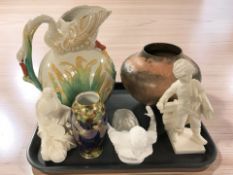 A Carlton Ware cobalt blue ground lustre vase, decorated with butterflies in a spider's web,