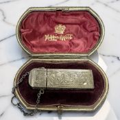 A Victorian silver scent bottle, Hilliard & Thomason, Birmingham 1893, length 5.